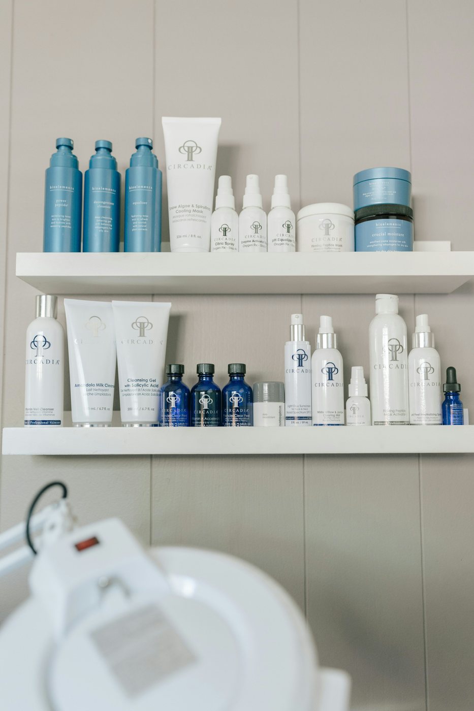 Illustrative shelves of bath and body containers